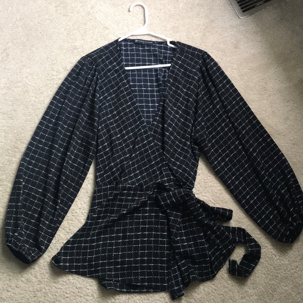 Black and white striped wrap blouse